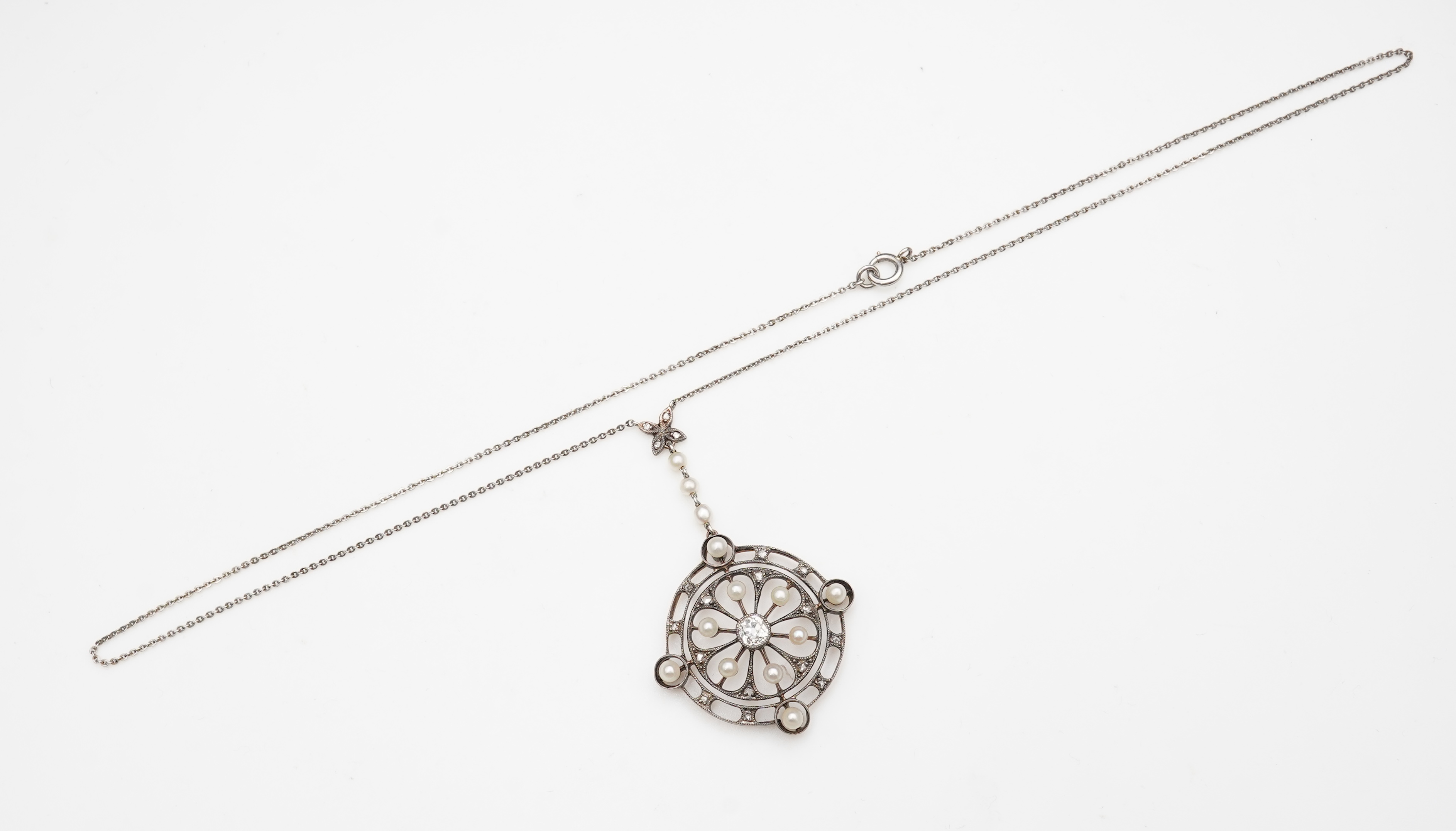 An Edwardian diamond and pearl pendant, early 20th century